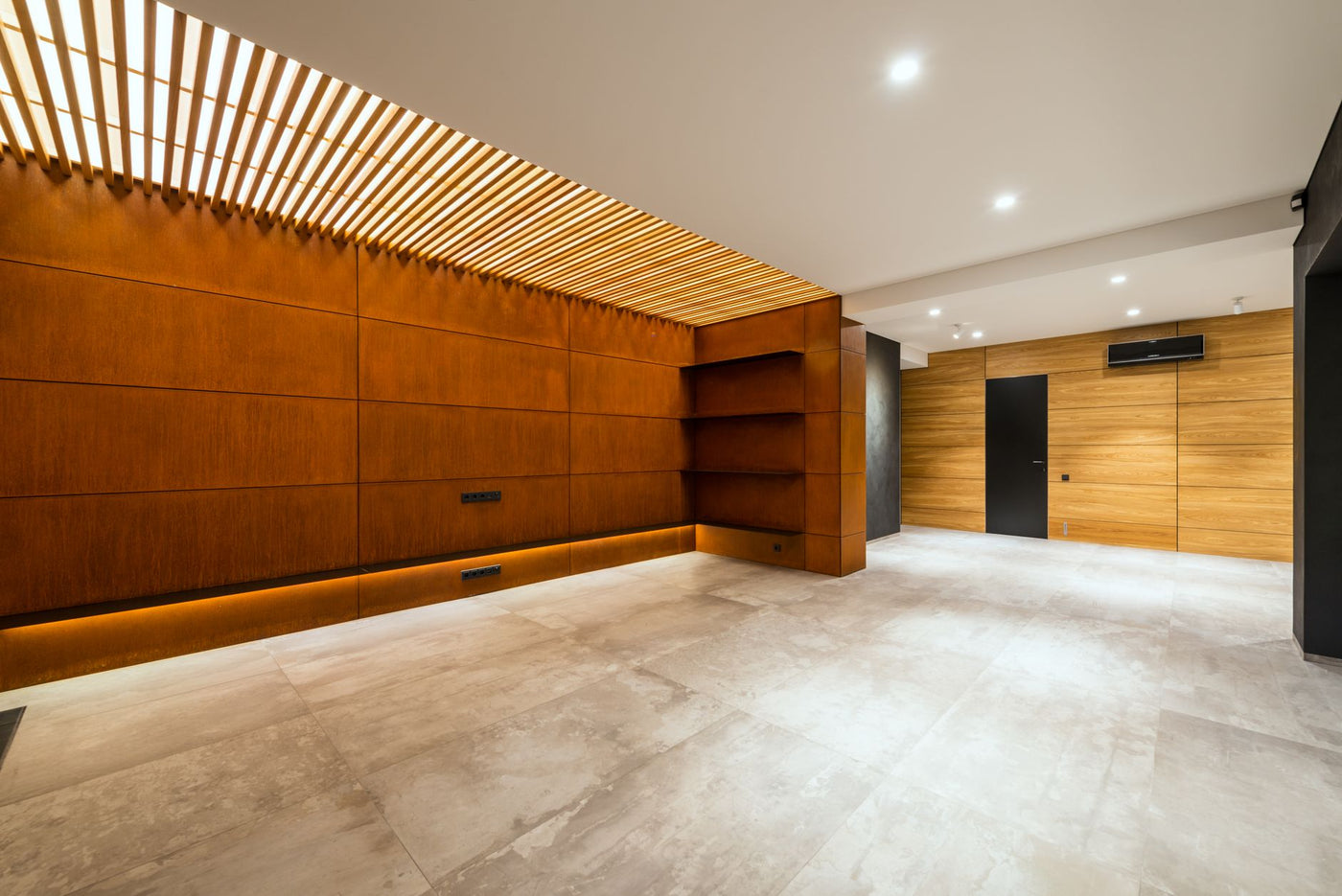 Modern corridor interior with entrance door and air conditioning against wooden shelves above floor in house